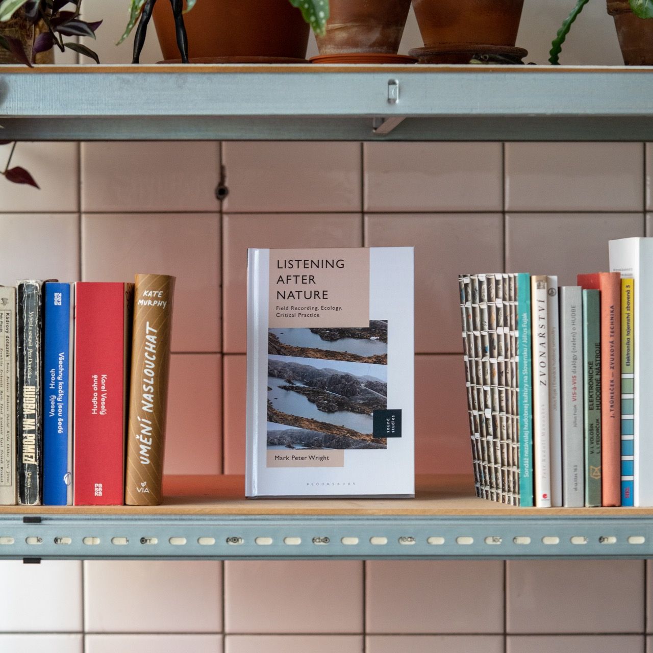 Books on a shelf in the LOM library